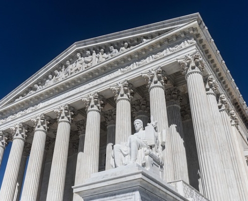 United States Supreme Court Building from ground level looking up.