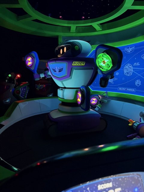 Interactive targets inside Magic Kingdom Buzz Lightyear ride